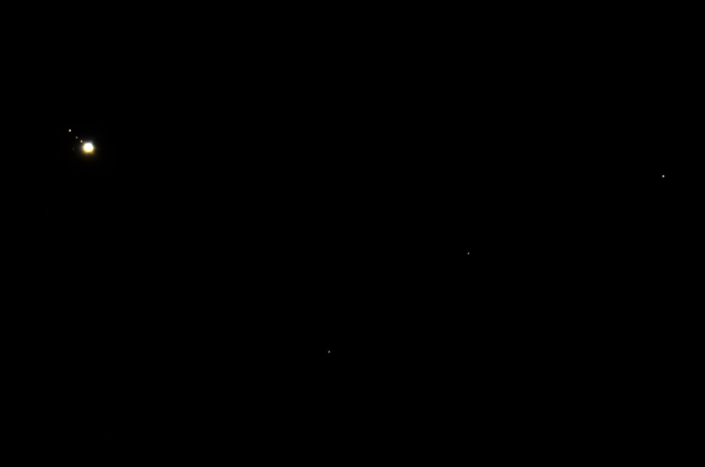 Photograph of Jupiter and its moons