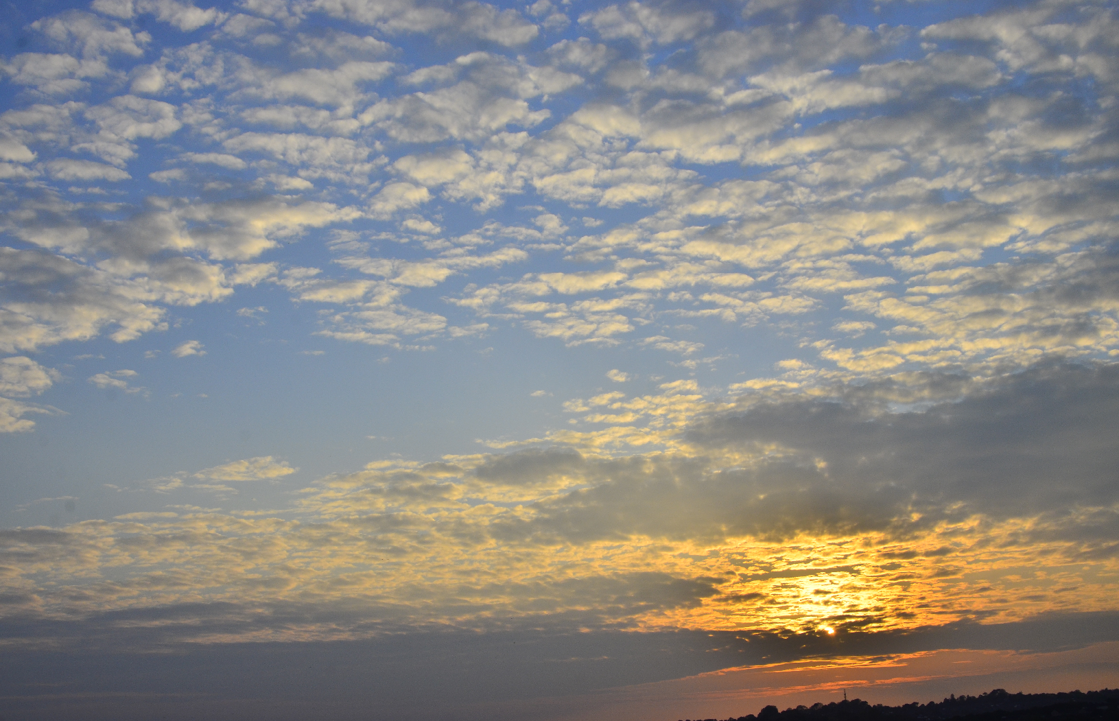 Broken clouds at sunset