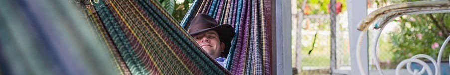 guy with hat in hammock