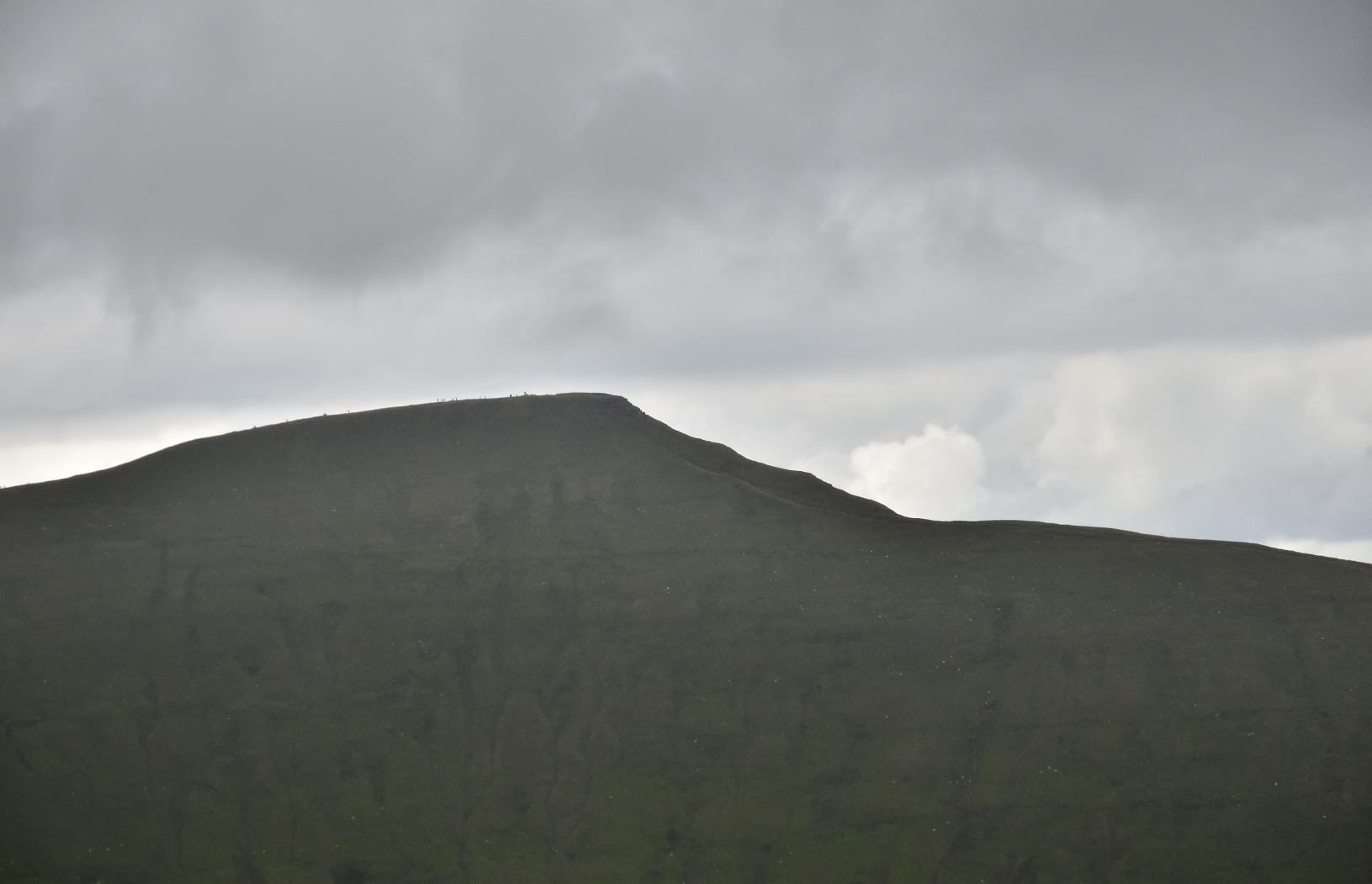People walking along the path to or from the summit of Pen Y Fan